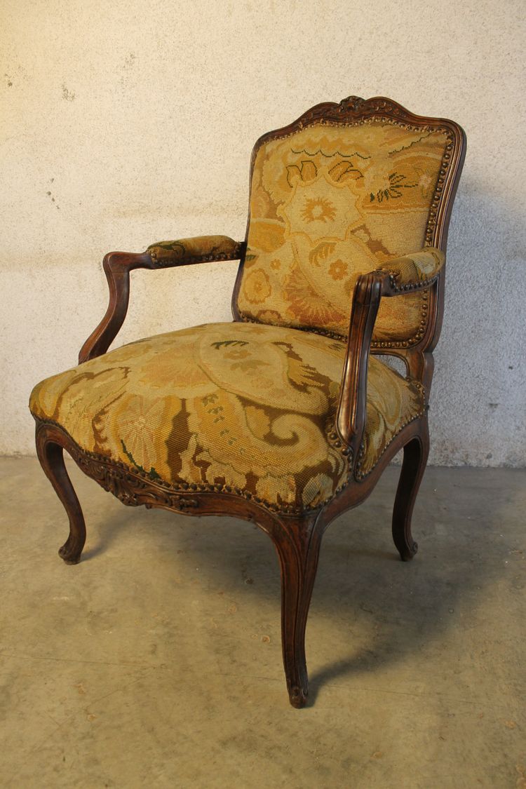 Large Louis XV period carved and molded walnut armchair with flat Queen back 18th century