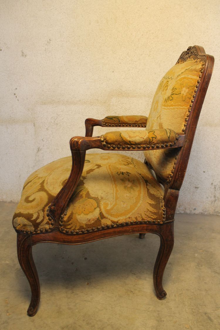 Large Louis XV period carved and molded walnut armchair with flat Queen back 18th century