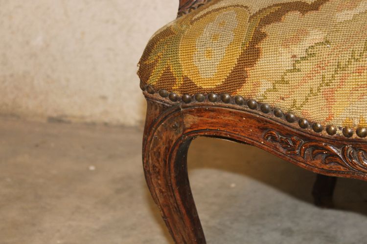 Large Louis XV period carved and molded walnut armchair with flat Queen back 18th century