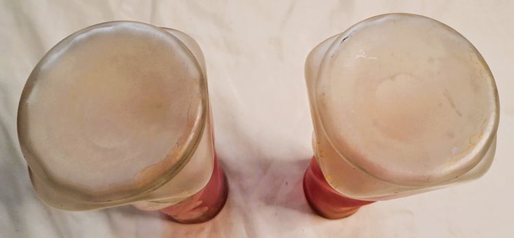 Pair of François Théodore Legras vases in enamelled twisted glass on a pink background with floral decoration, early 20th century