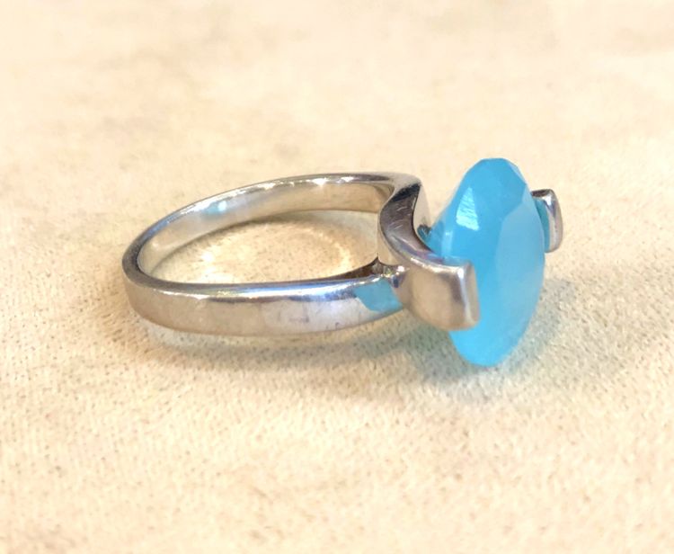 Silver ring with blue stone