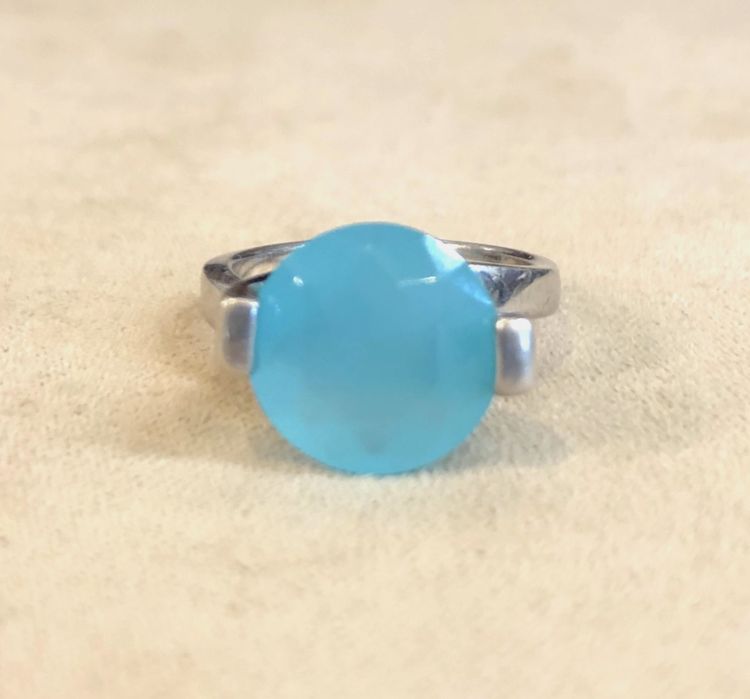 Silver ring with blue stone