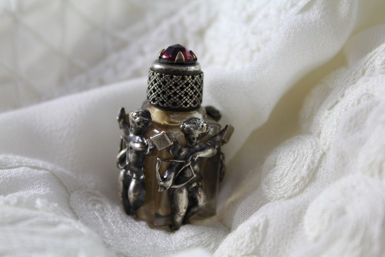 Miniature glass perfume bottle with silver mount "Cupid" late 19th century