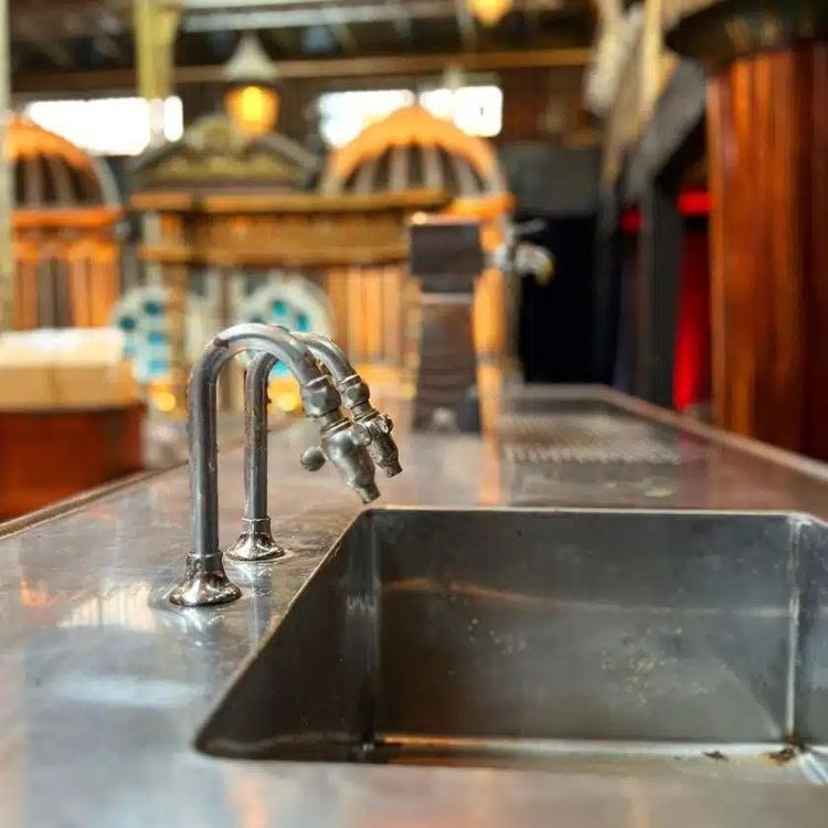 Oak bar counter with stainless steel top