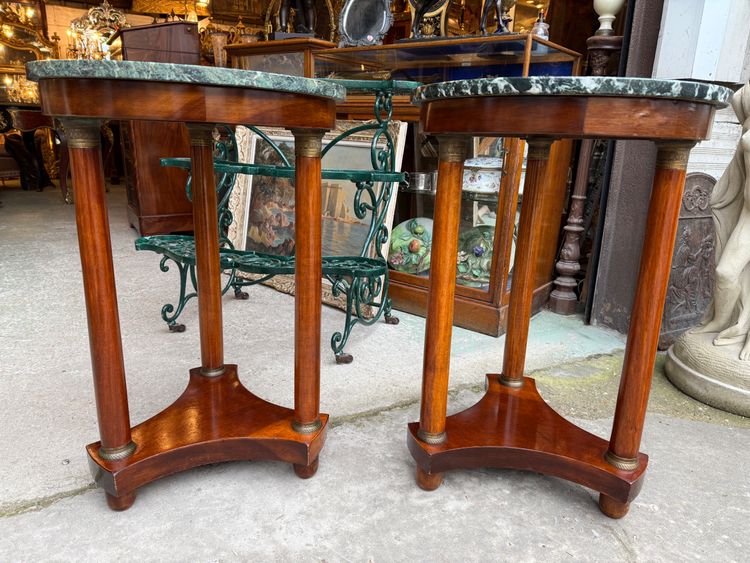 Pair of Empire style mahogany pedestal tables, veined marble top