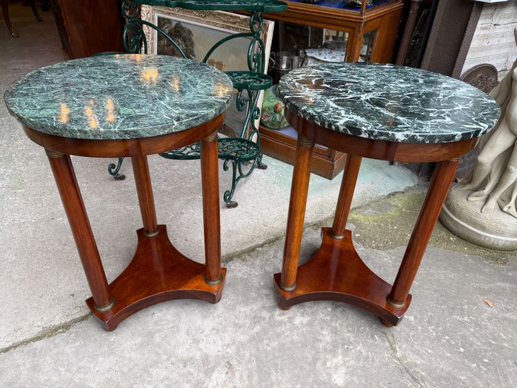 Pair of Empire style mahogany pedestal tables, veined marble top