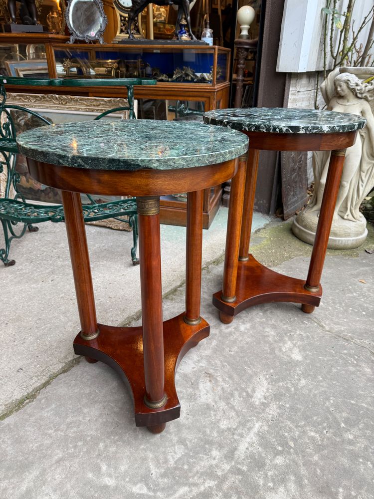 Pair of Empire style mahogany pedestal tables, veined marble top