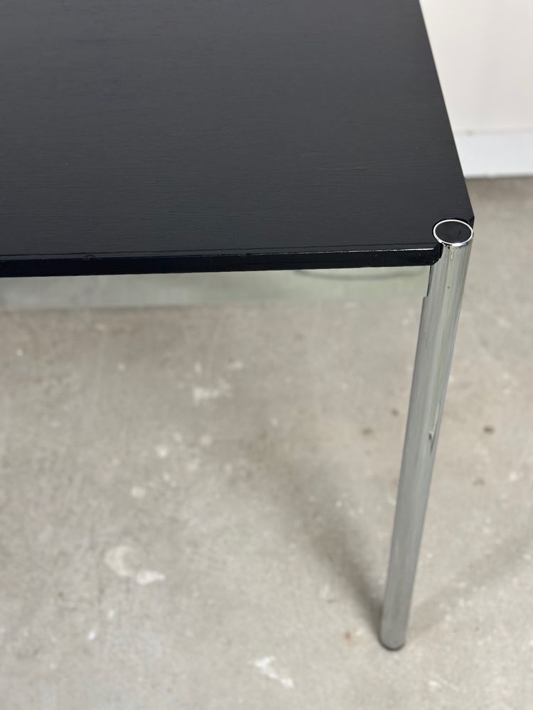 USM Haller T59 table in black laminate and chrome steel