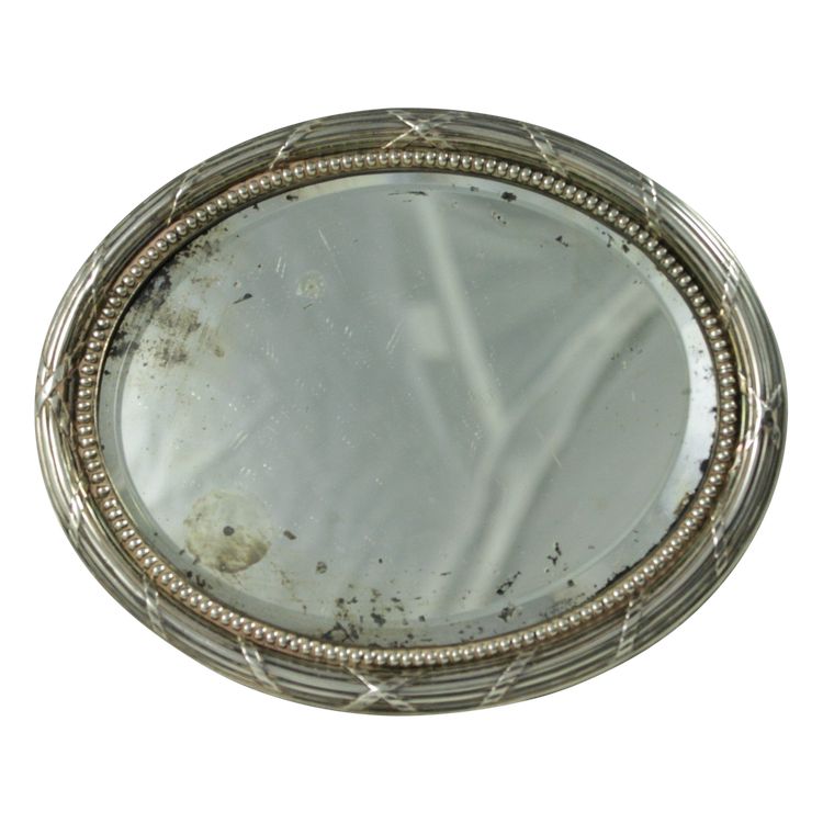 Small oval beveled mirror with solid silver frame circa 1900