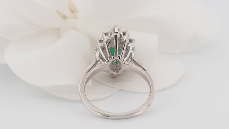 Marquise ring in white gold, emerald and diamonds