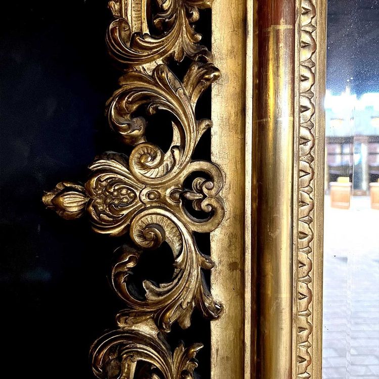 Louis XV Rocaille Style Gilded Wood and Stucco Mirror