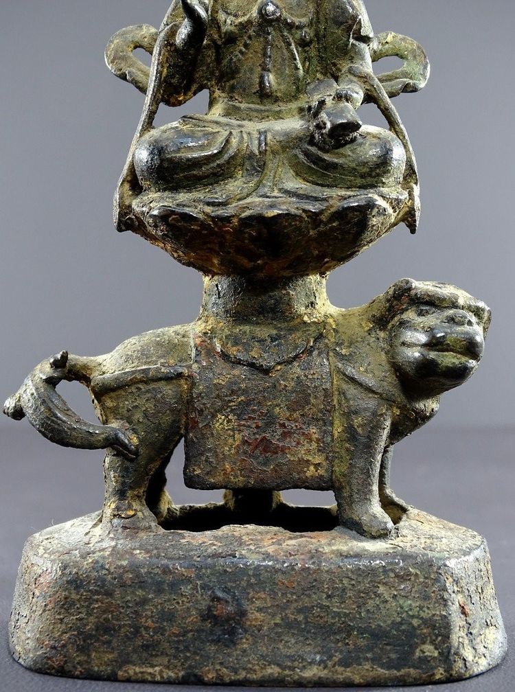 China, Ming Dynasty, Late 14th-early 15th century, Bronze Statuette of Majushri on a Lion.