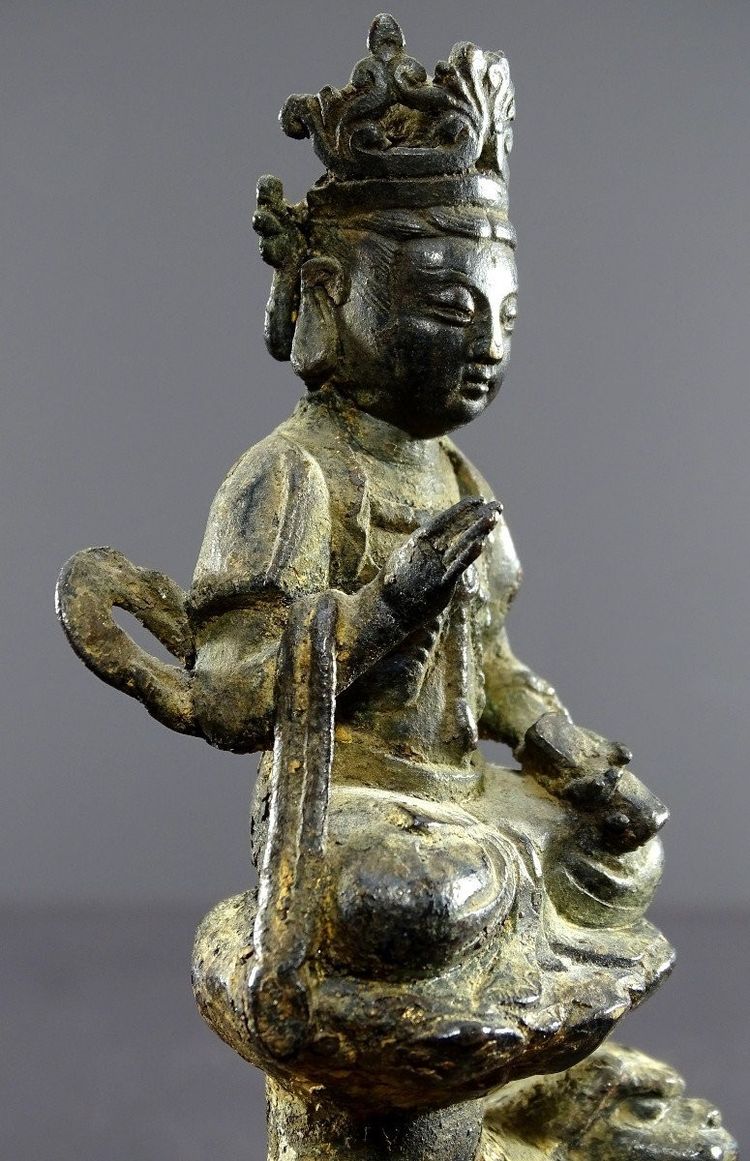 China, Ming Dynasty, Late 14th-early 15th century, Bronze Statuette of Majushri on a Lion.