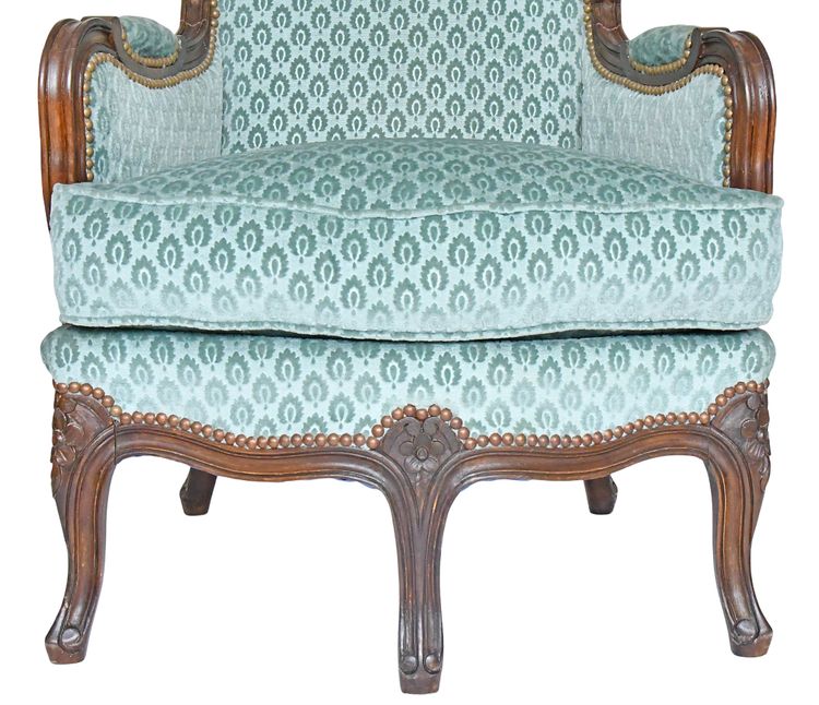 Pair of Louis XV style wingback armchairs with five legs