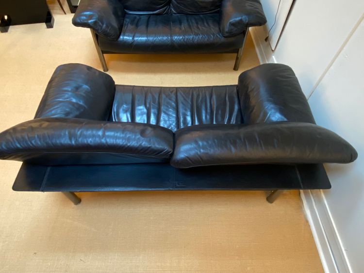 Pair of black leather sofas produced by Poltrona Frau, circa 1980/1990.