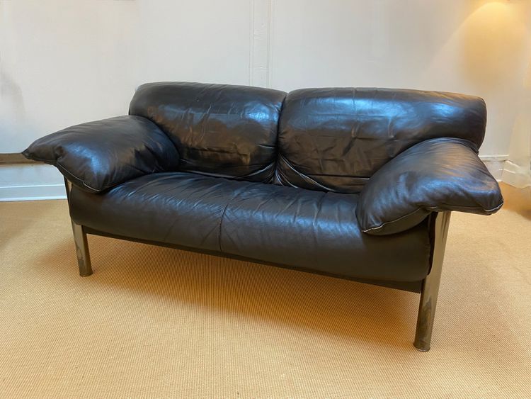 Pair of black leather sofas produced by Poltrona Frau, circa 1980/1990.