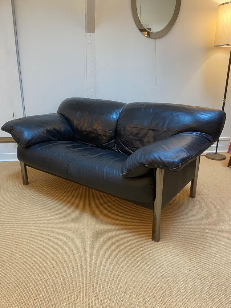 Pair of black leather sofas produced by Poltrona Frau, circa 1980/1990.