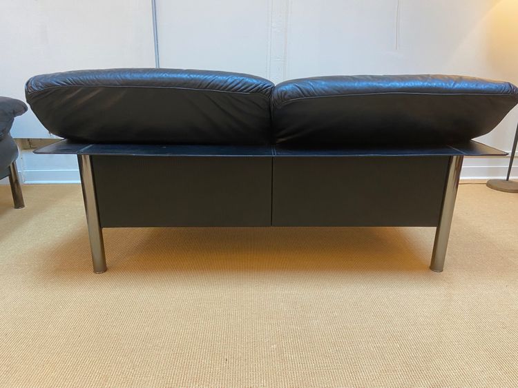 Pair of black leather sofas produced by Poltrona Frau, circa 1980/1990.