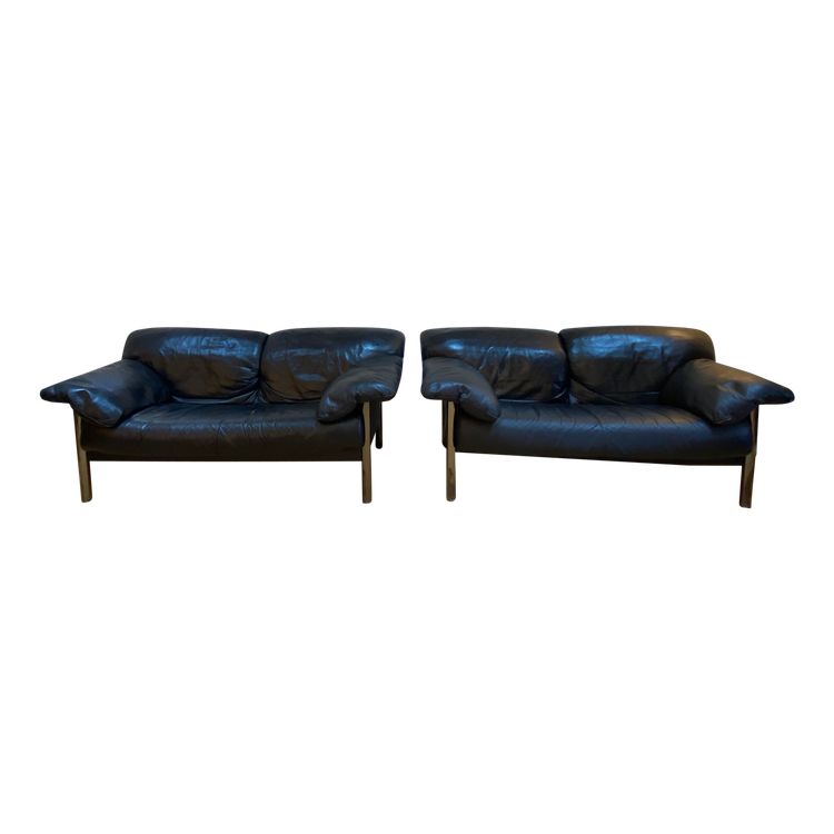 Pair of black leather sofas produced by Poltrona Frau, circa 1980/1990.