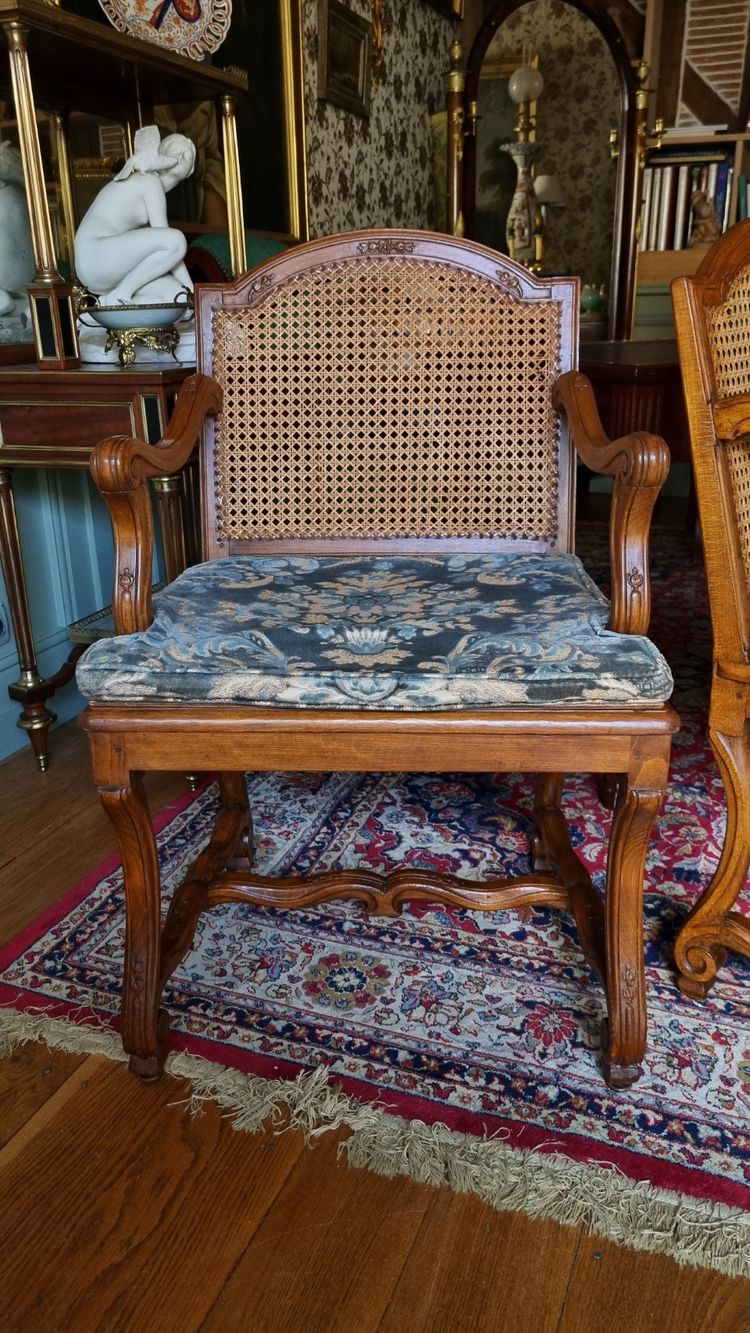 Pair of Louis XIV style caned armchairs. Late 19th century.