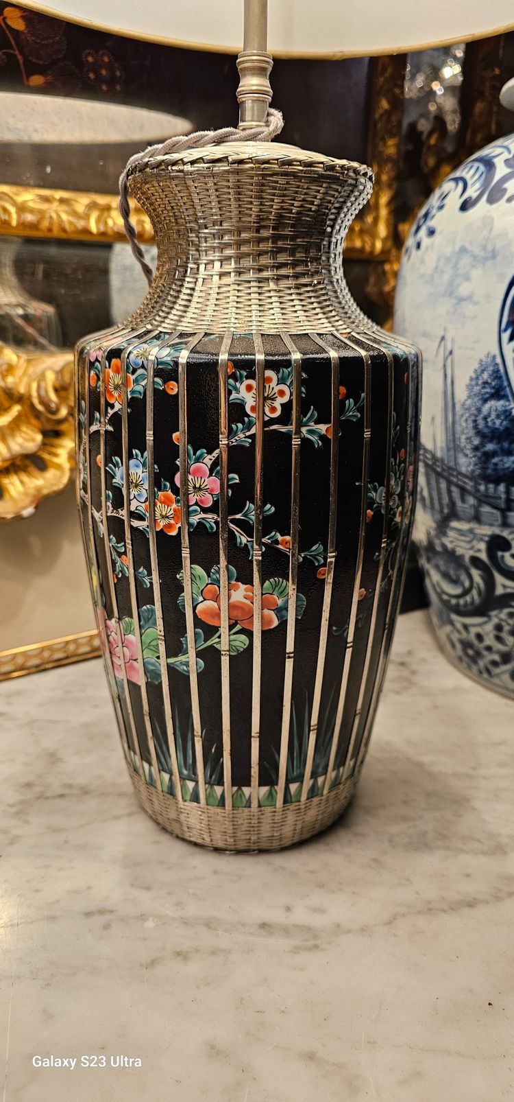 Pair of lamps with birds and branches in their silver cages, Japan circa 1920.