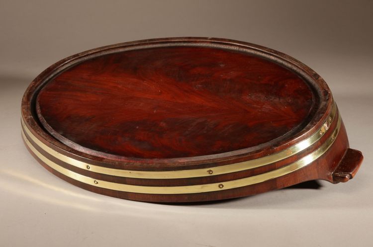 Original oval tray in mahogany and brass.