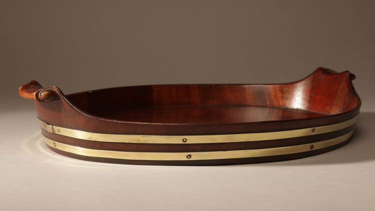 Original oval tray in mahogany and brass.