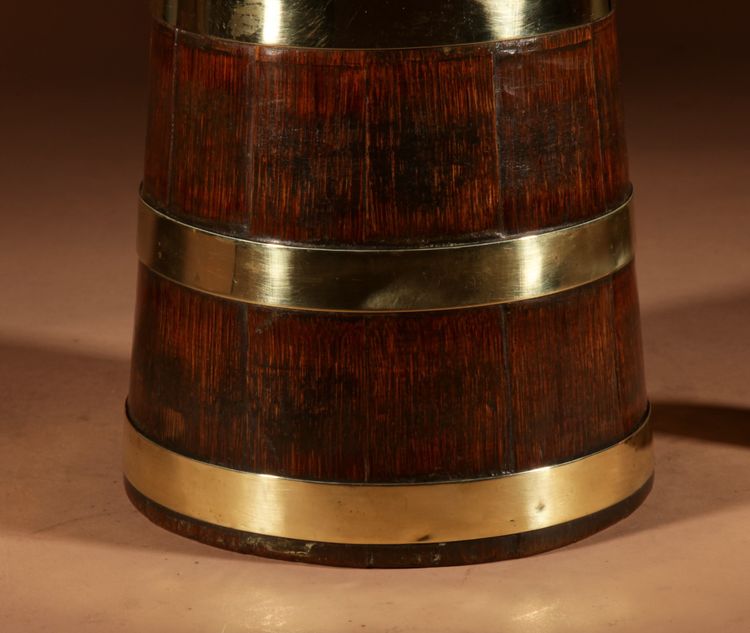 Oak and brass barrel, possibly herring-shaped, circa 1850.