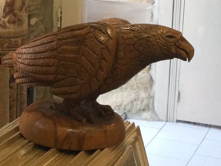 Carved wooden bird of prey