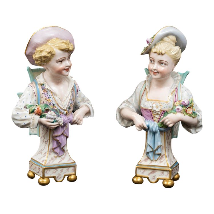 Pair of porcelain flower-bearing sculptures, Germany, early 20th century.