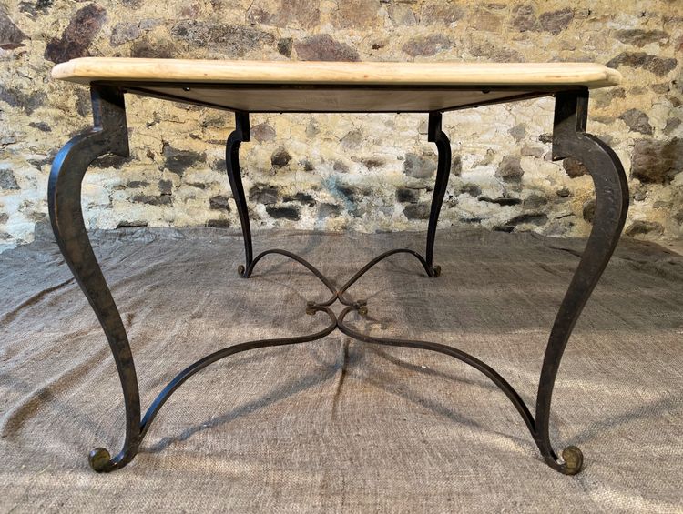 Wrought iron coffee table with raw oak top