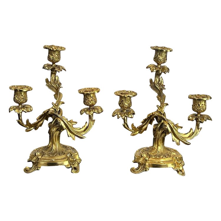 PAIR OF LATE 19TH CENTURY GILT-BRONZE THREE-BRANCH CANDLESTICKS IN LOUIS XV STYLE