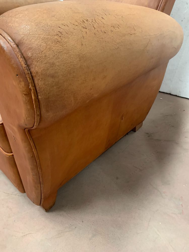 Pair of Art Deco club armchairs in tawny leather, 20th century