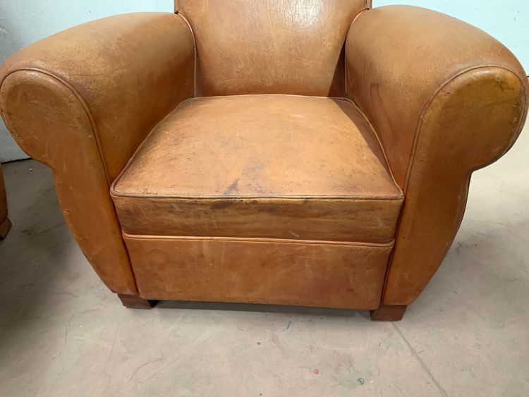 Pair of Art Deco club armchairs in tawny leather, 20th century