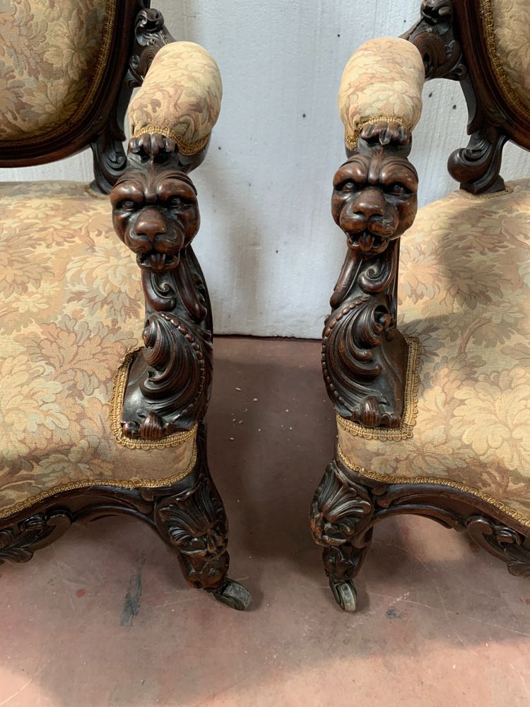 Pair of armchairs with carved wooden medallions, 19th century