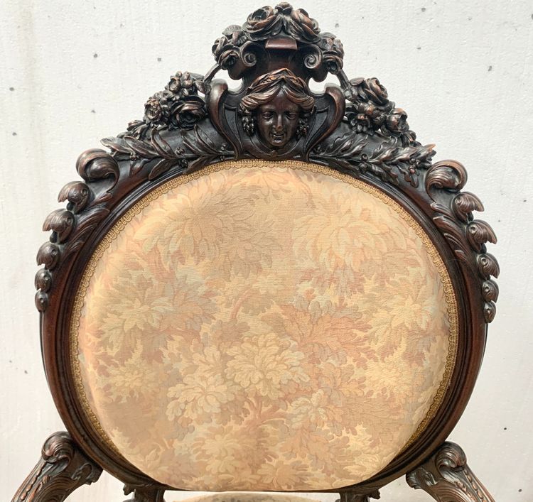 Pair of armchairs with carved wooden medallions, 19th century