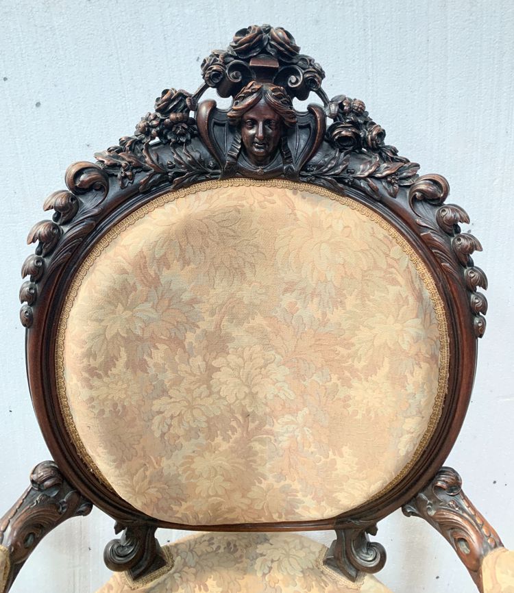 Pair of armchairs with carved wooden medallions, 19th century