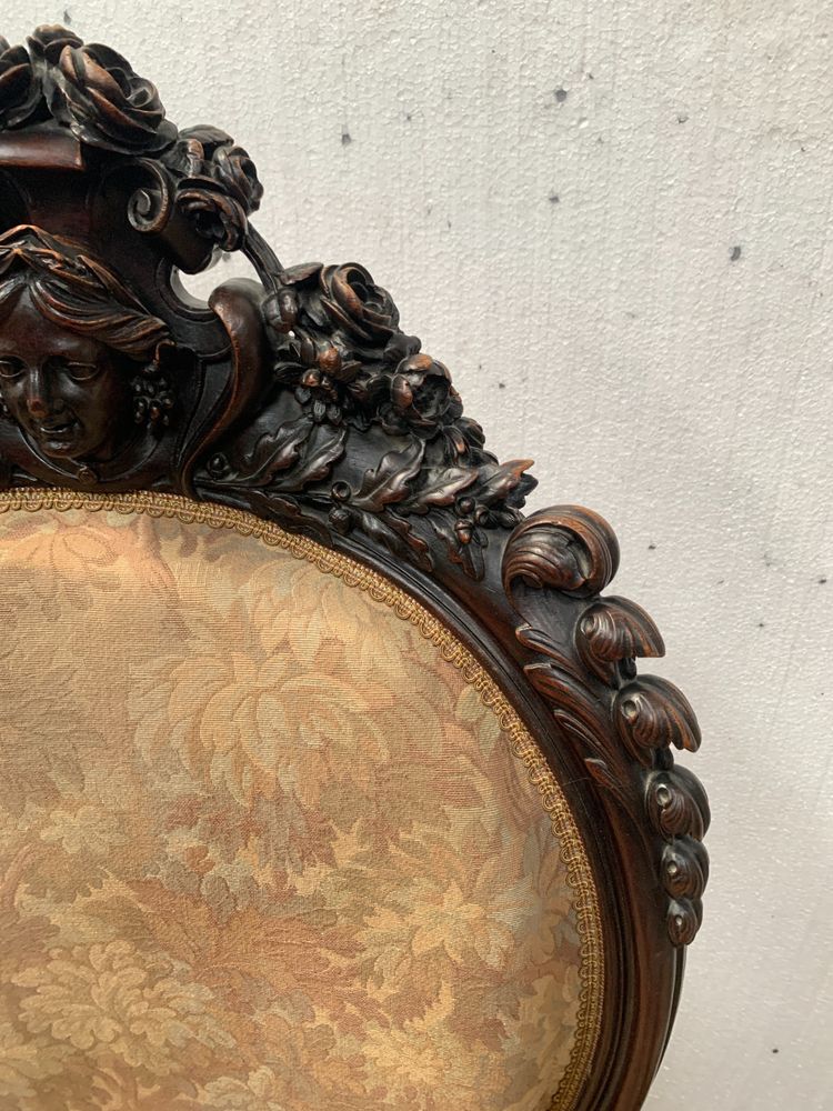 Pair of armchairs with carved wooden medallions, 19th century