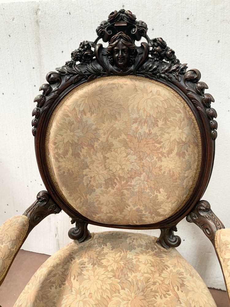 Pair of armchairs with carved wooden medallions, 19th century