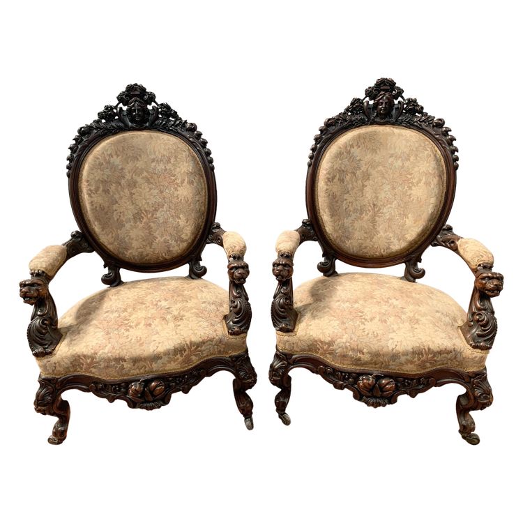 Pair of armchairs with carved wooden medallions, 19th century