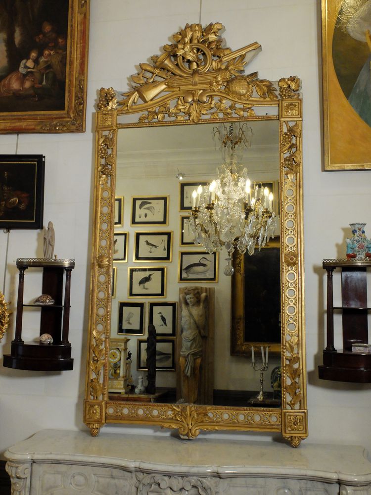 Louis XVI mirror with hunting attributes