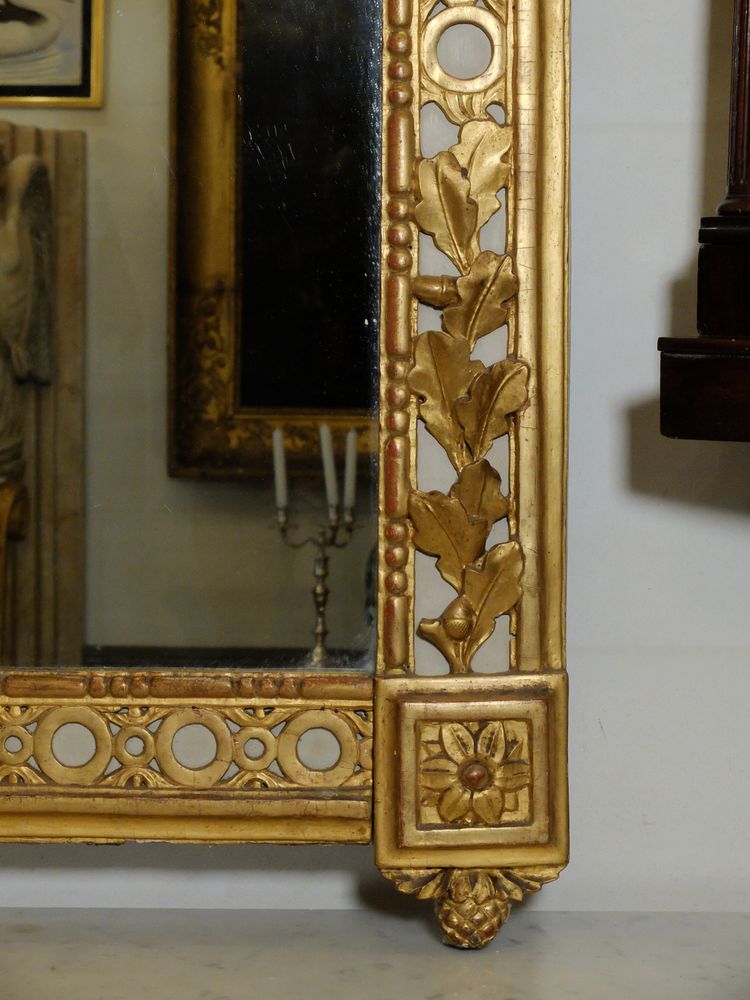 Louis XVI mirror with hunting attributes