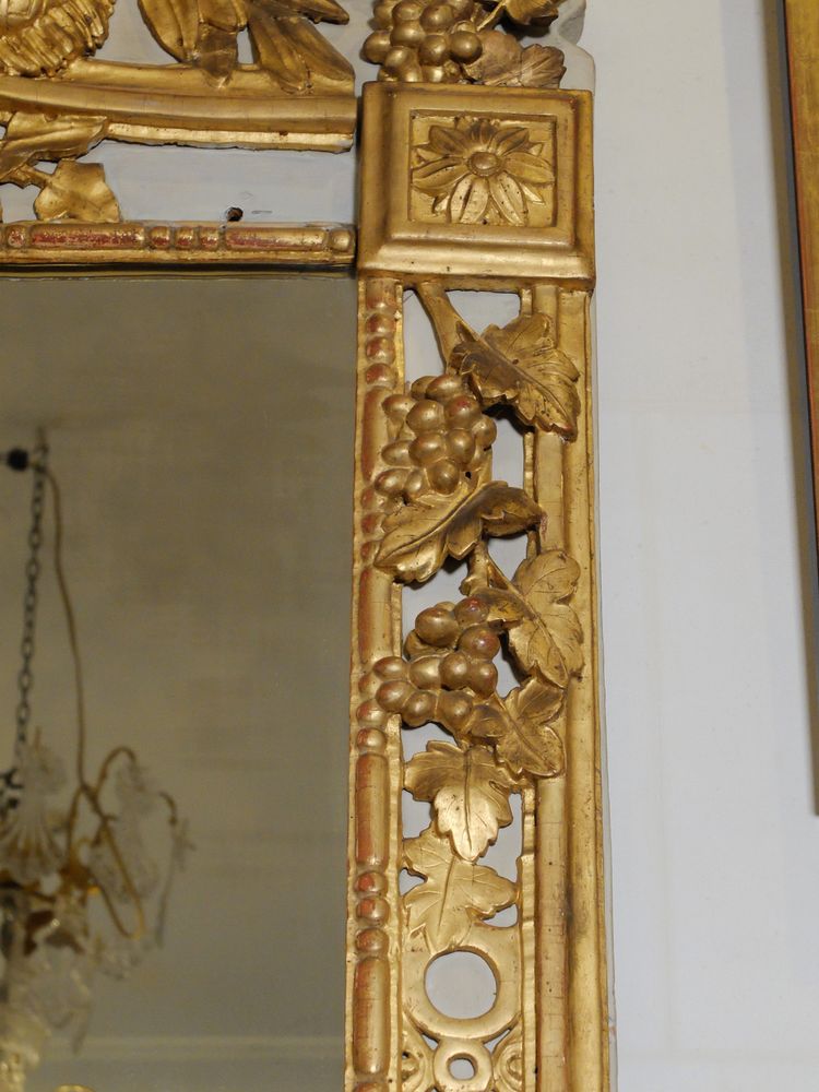 Louis XVI mirror with hunting attributes