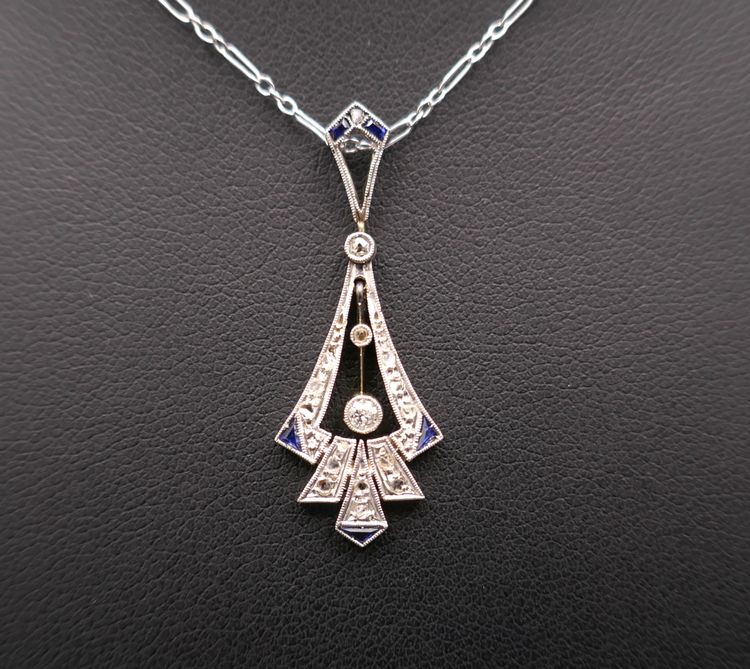 Art Deco Pendant Calibrated Diamonds And Sapphires, White Gold And Platinum.