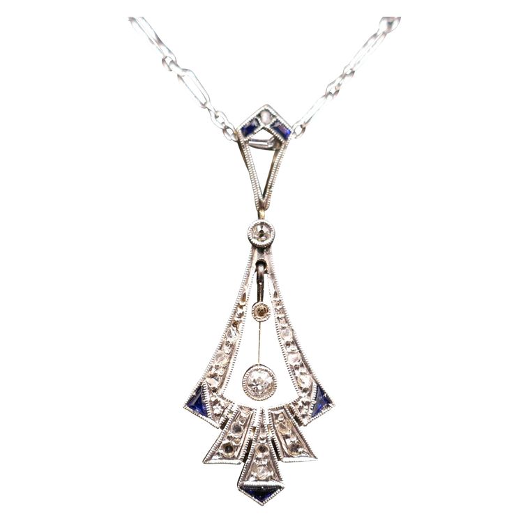 Art Deco Pendant Calibrated Diamonds And Sapphires, White Gold And Platinum.