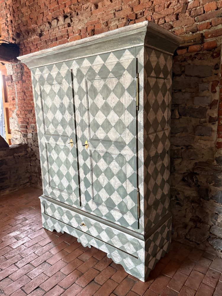 19th century patinated wardrobe with coloured square shape