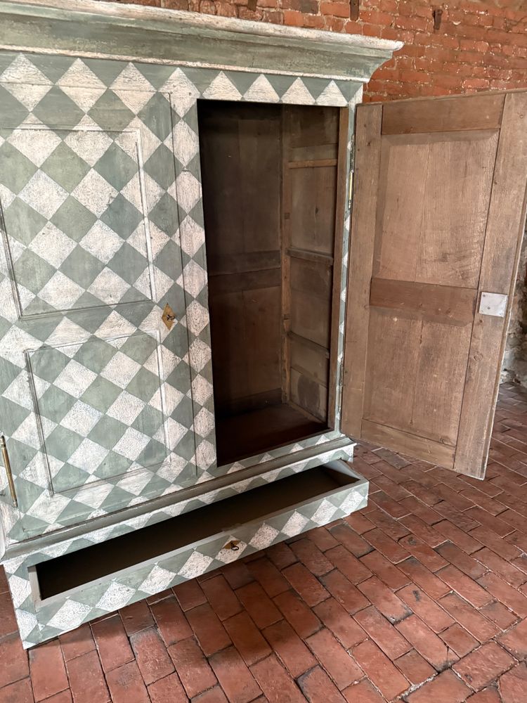 19th century patinated wardrobe with coloured square shape