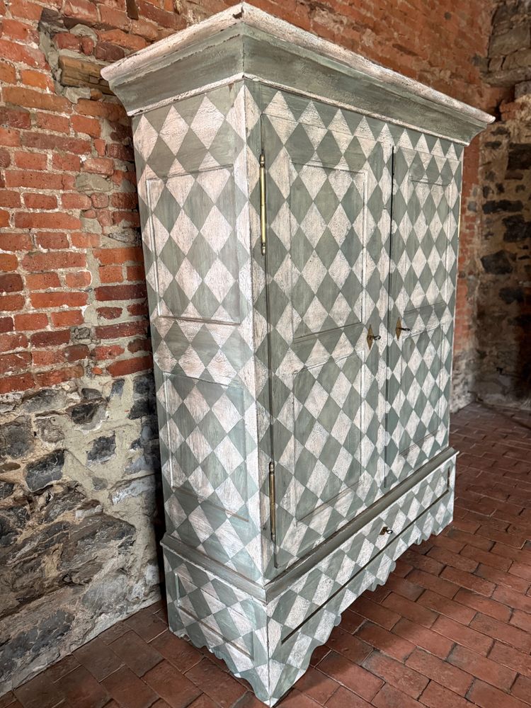 19th century patinated wardrobe with coloured square shape