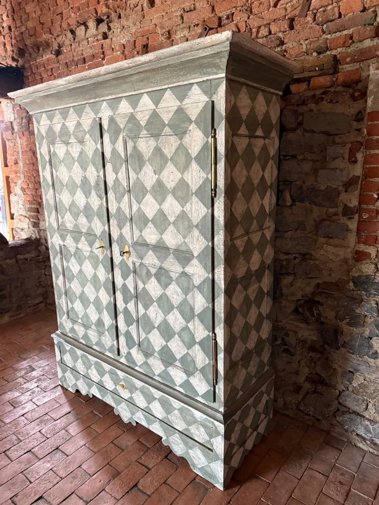 19th century patinated wardrobe with coloured square shape