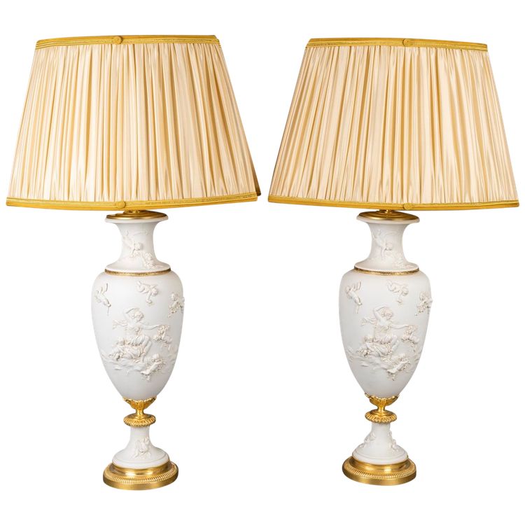 A pair of sèvres cookie vases mounted as lamps, 19th century